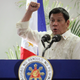 Philippine President Rodrigo Duterte speaks after arriving from Malaysia, at Davao International airport in Davao city in southern Philippines, November 11, 2016.